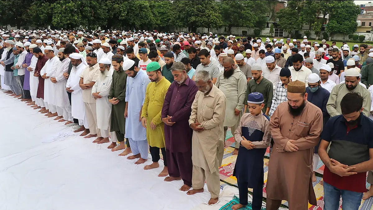 Muslim devotees offer prayers on the occasion of Eid al-Adha, at Eidgah in Jammu.