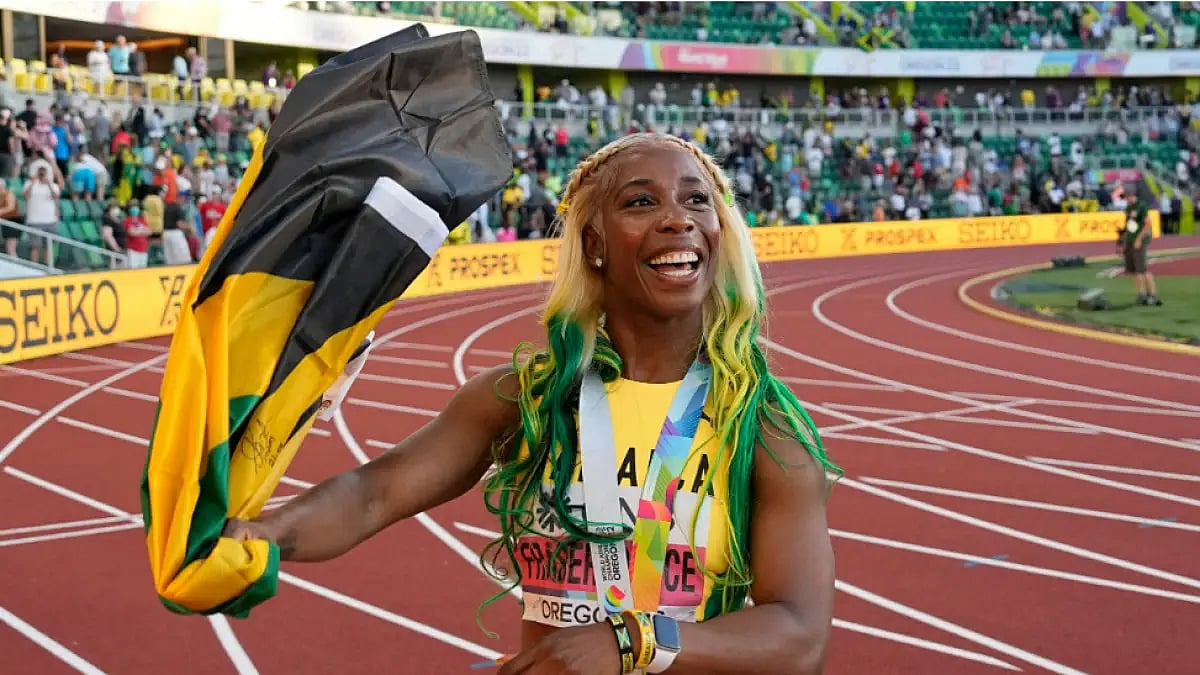 Shelly-Ann Fraser-Pryce reacts after winning World Athletics Championships 2022 100m gold.