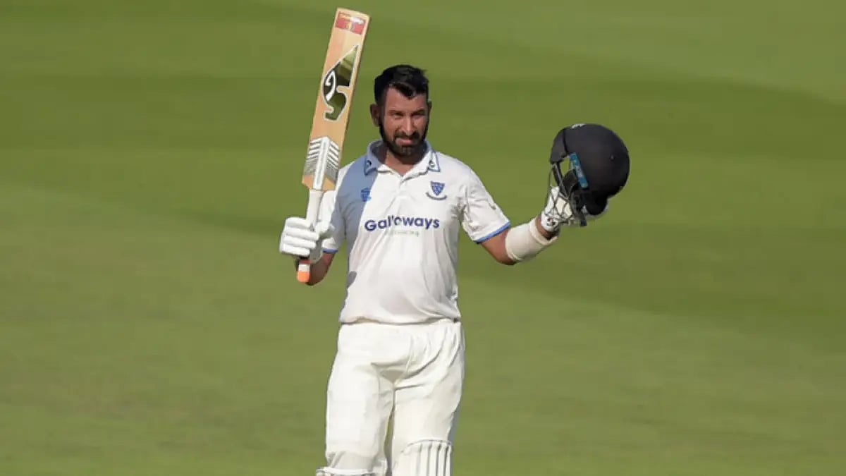 File : Cheteshwar Pujara celebrates after scoring his double ton for Sussex