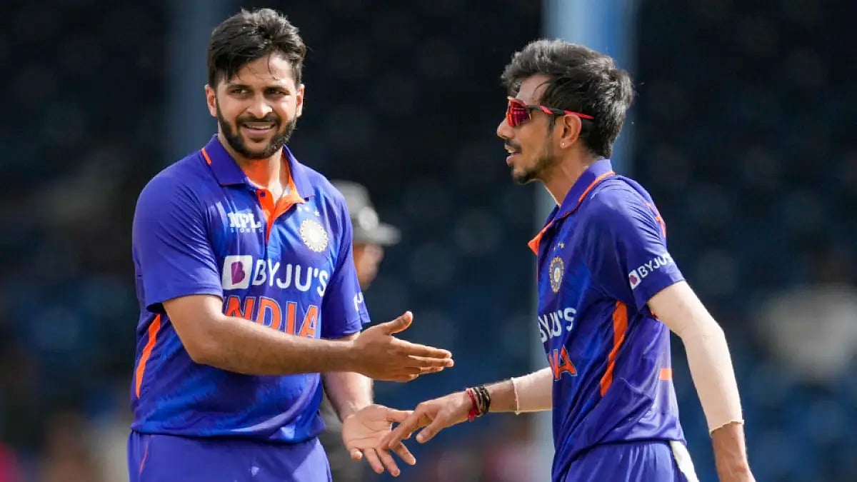 Shardul Thakur and Yuzvendra Chahal celebrate the fall of a West Indies wicket in first ODI. 