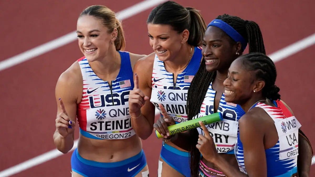 Team USA pose after winning 4x100m relay gold at the World Athletics Championships 2022.