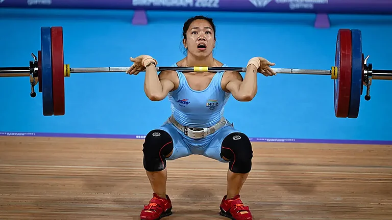 Indian weightlifter Mirabai Chanu in action at CWG 2022. - null