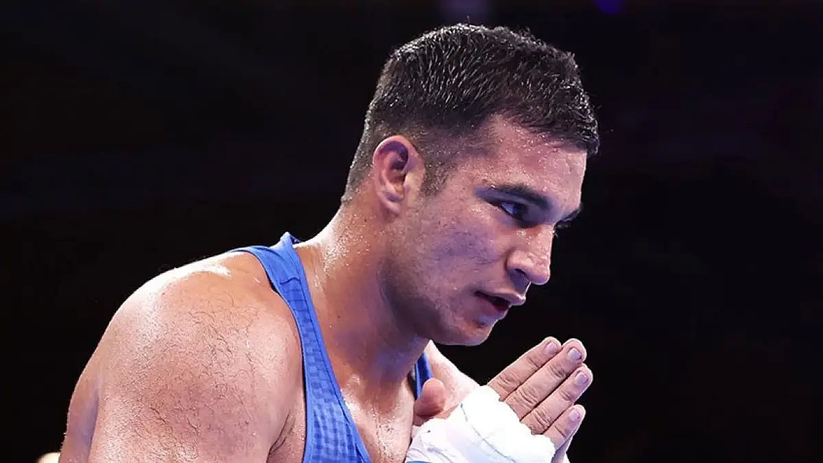Sagar Ahlawat notched up a 5-0 win in the super heavyweight quarter-final.