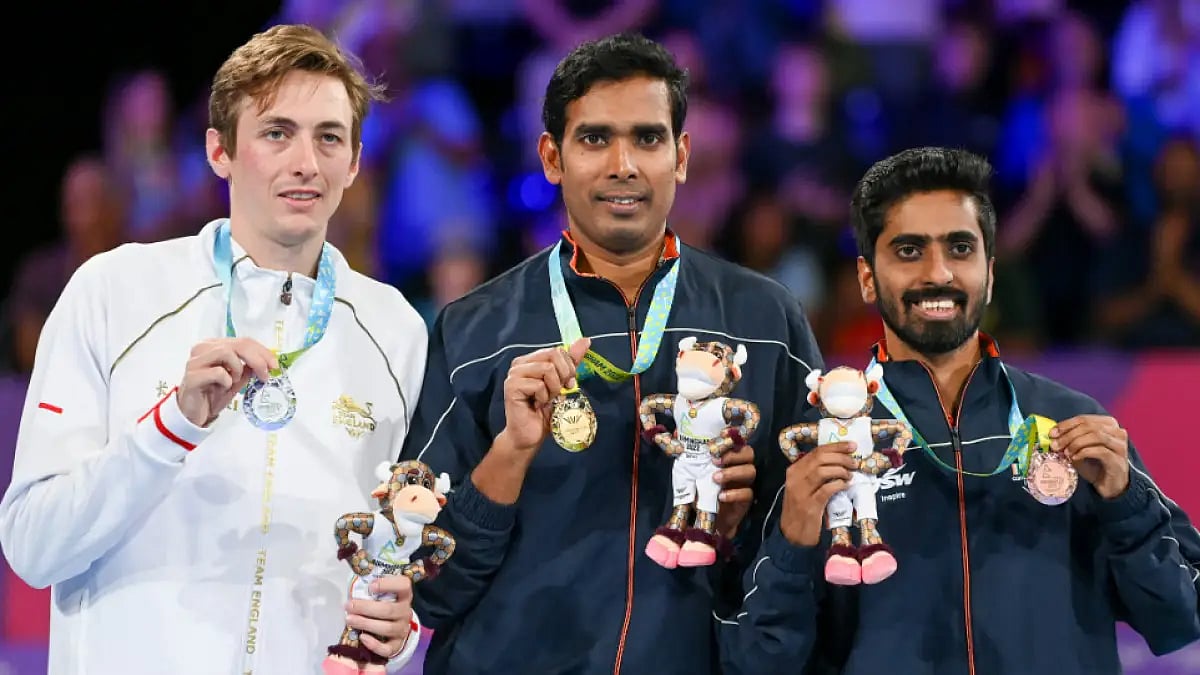 (From L) Liam Pitchford,  Achanta Sharath Kamal and G Sathiyan during CWG 2022 medal ceremony.