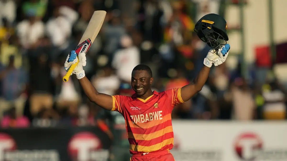 Zimbabwe's Regis Chakabva celebrates a century against Bangladesh during their second ODI match.