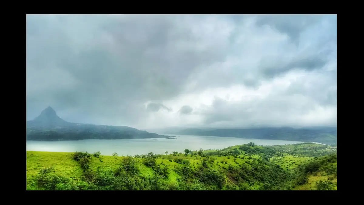 Monsoon clouds roll over the backwater of Pawna Dam