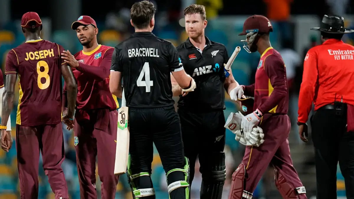 New Zealand players (in black) celebrate after winning the third ODI and series against West Indies.