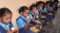 Children having eggs in Mid-day meal