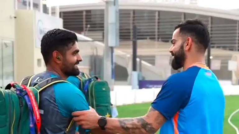 Pakistan captain Babar Azam and former India skipper Virat Kohli. - null