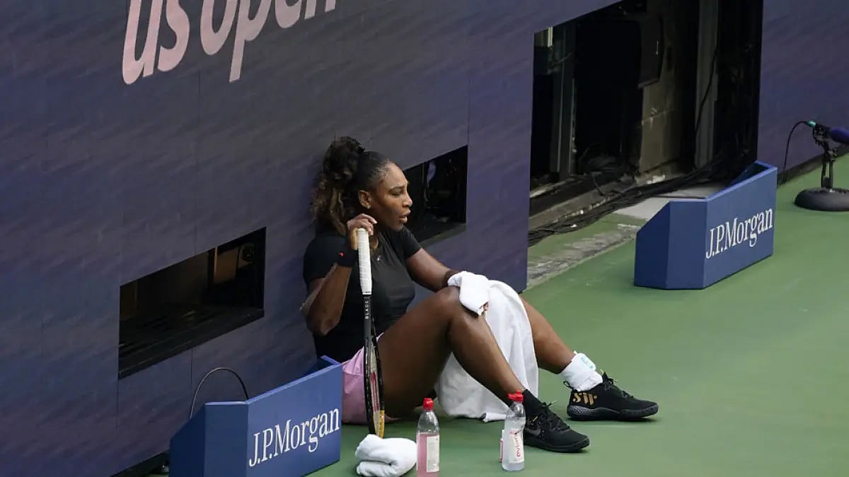 Serena Williams rests during a practice session at Arthur Ashe Stadium.