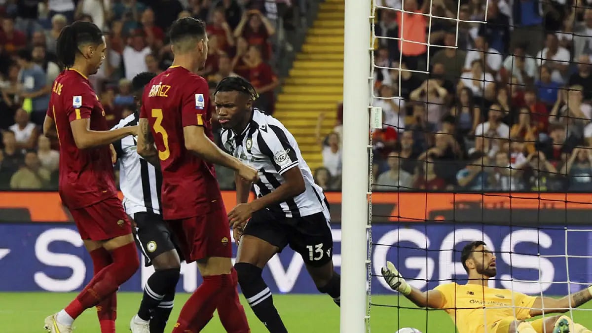 Udinese's Destiny Udogie scores a goal against AS Roma.