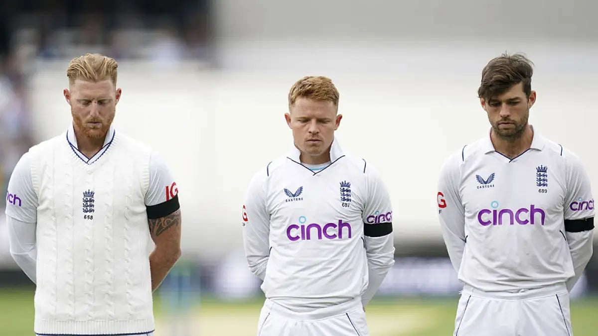 England players observe a minute's silence.