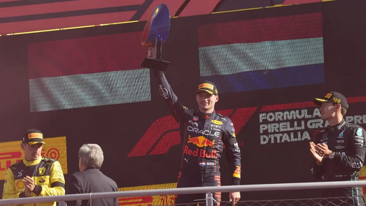 Max Verstappen celebrates on the podium after winning the Italian Grand Prix.