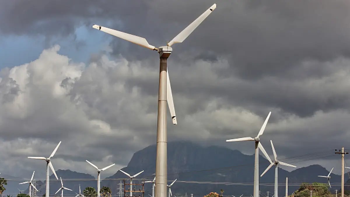 Wind turbines generate electricity in Punniyavalanpuram, Tamil Nadu, India.