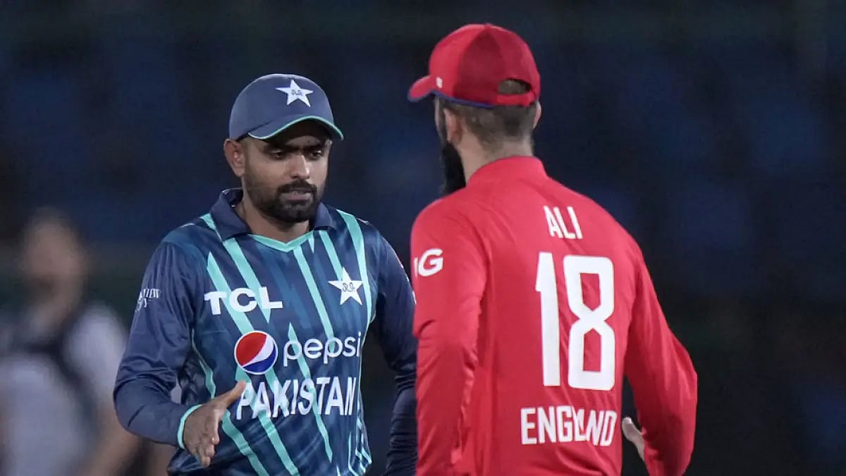 Babar Azam and Moeen Ali at the toss.
