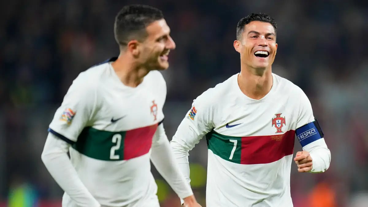 Portugal's Diogo Dalot and Cristiano Ronaldo celebrate theur win against Czech Republic on Saturday.