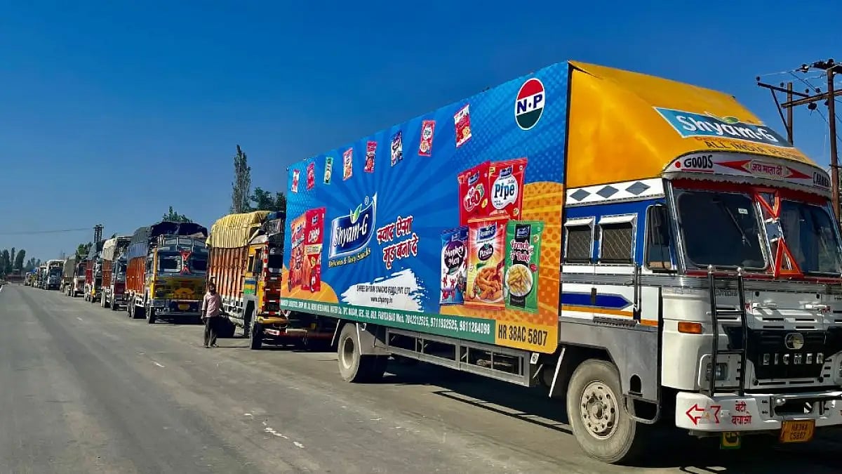 Apple-laden truck on highway.