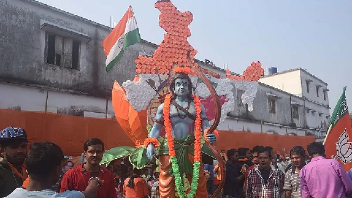 A tableau with India map and Hindu deity Ram during a BJP rally in Thakurnagar.