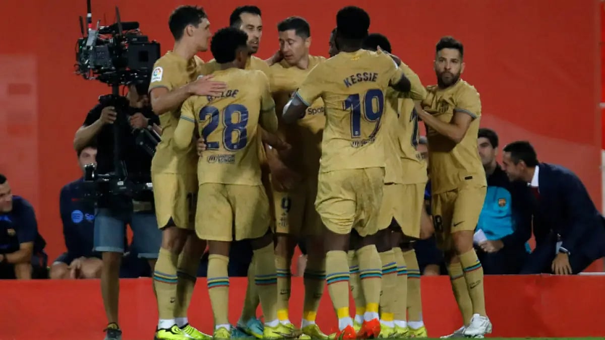 Barcelona players celebrate after Robert Lewandowski scored against Mallorca. 