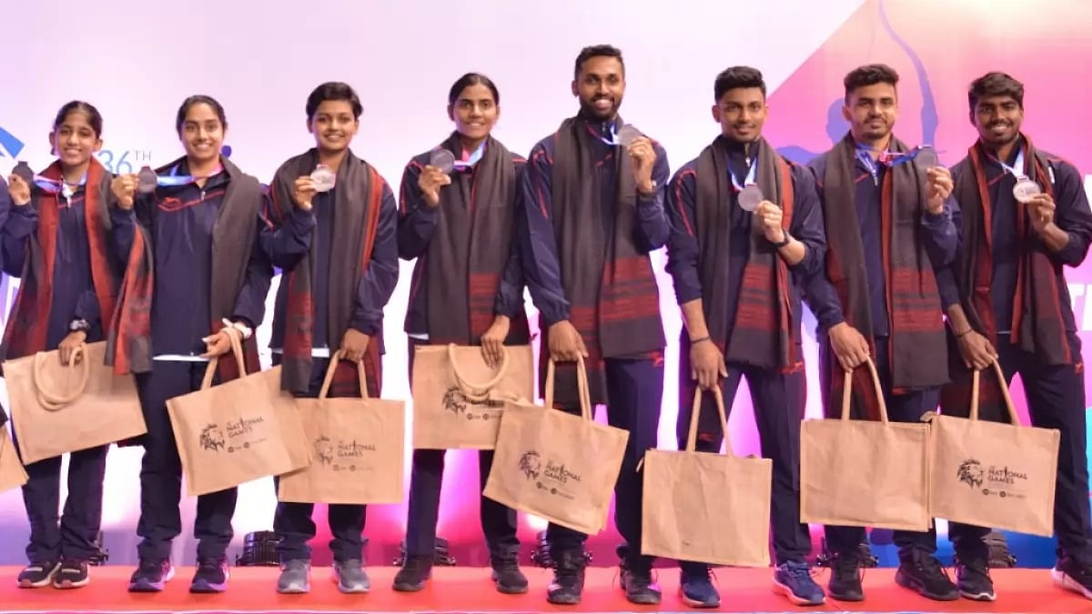 Telangana mixed team gold medal winners pose for photographs at National Games 2022. 