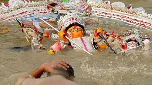 Idol of Goddess Durga half-immersed.
