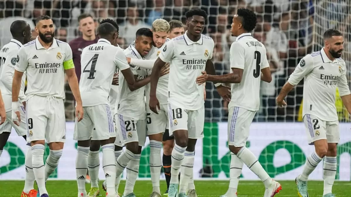 Real Madrid players celebrate after scoring against Shakhtar Donetsk in Champions League. 
