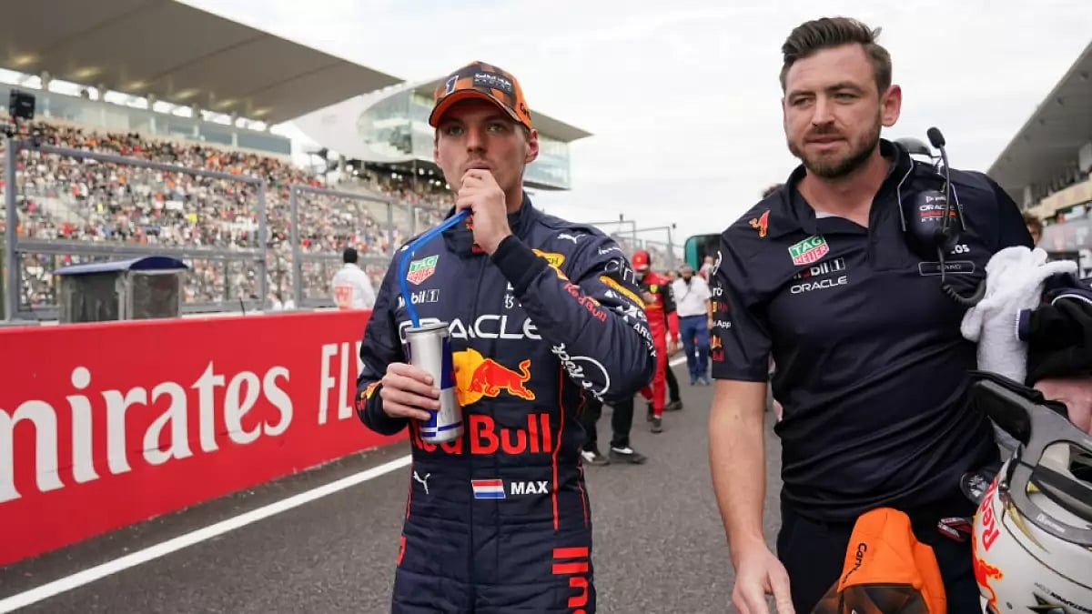 Max Verstappen drinks after finishing first at Japanese F1 Grand Prix qualifying on Saturday.