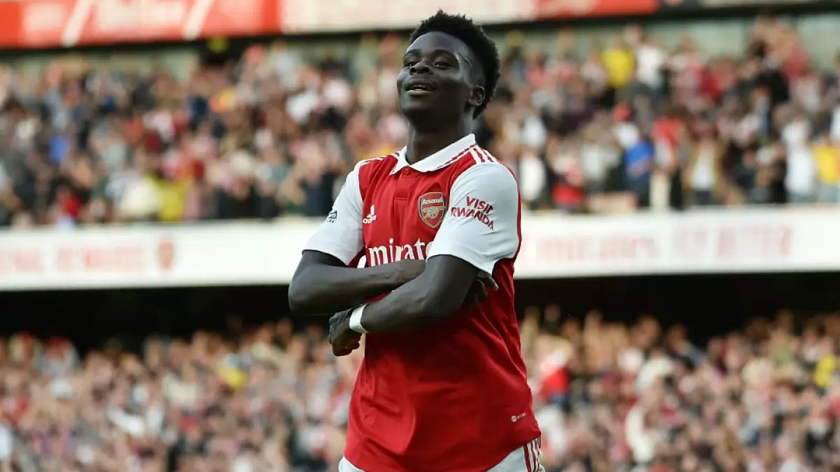 Arsenal's Bukayo Saka celebrates after scoring the winner against Liverpool in Premier League.