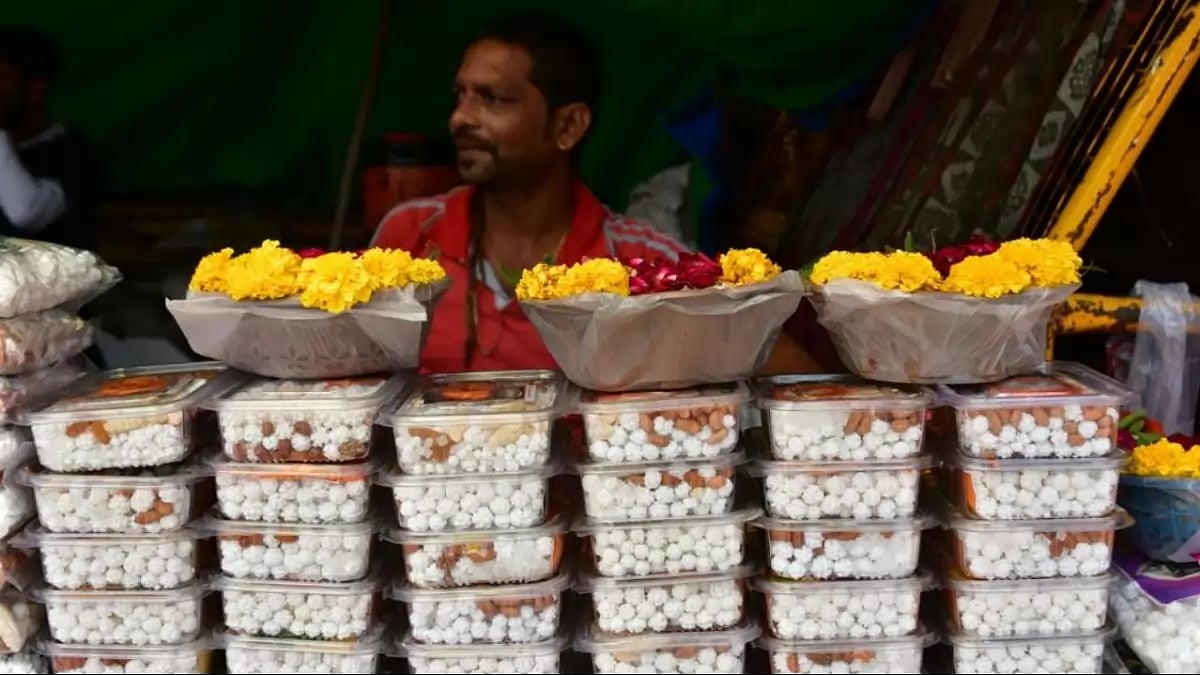 A flower vendor in Ujjains Makaleshwar temple corridor area 