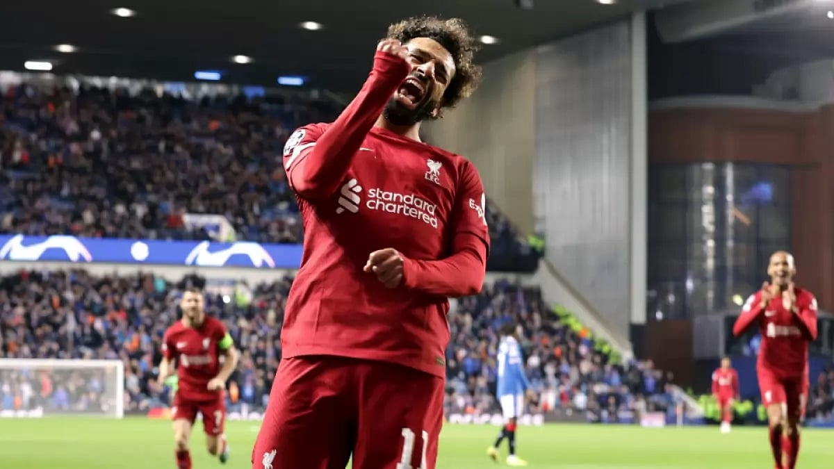Mohamed Salah celebrates after scoring against Rangers in UEFA Champions League.  