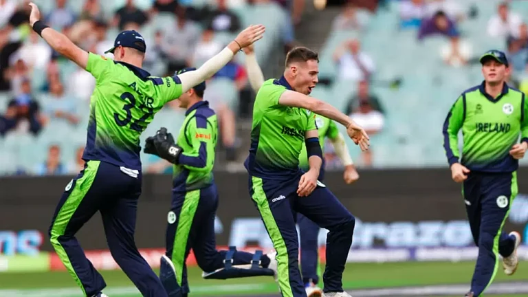 Ireland players celebrate the fall of England's Jos Buttler during their ICC T20 World Cup match. - null