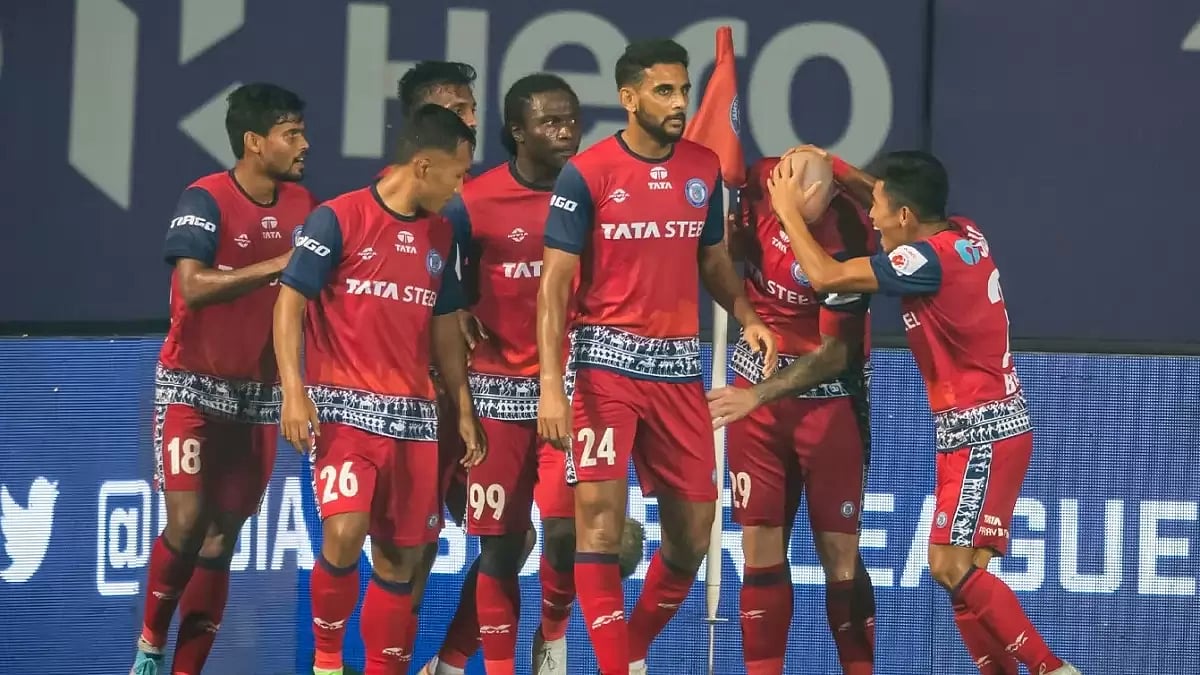 Jamshedpur FC players celebrate Peter Hartley's goal.