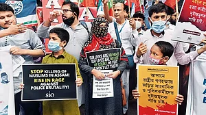 Say No To Eviction: People protest against the Assam government’s eviction drive before Assam Bhavan in Calcutta