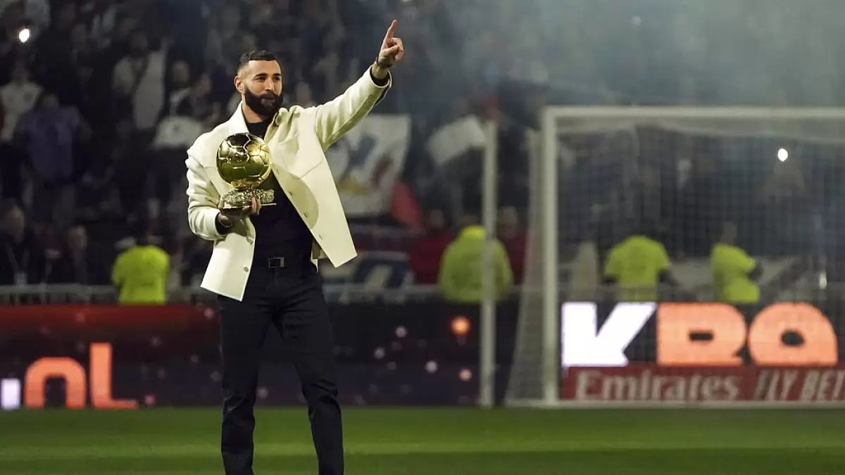 Frances Karim Benzema poses with his 2022 Ballon d'Or trophy.