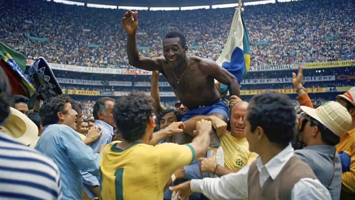 Pelé hoisted by team mates after the 1970 World Cup triumph.