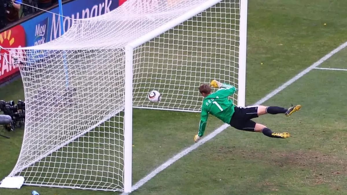Germany goalkeeper Manuel Neuer watches the ball go over the line.