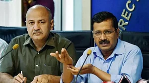 Delhi Deputy CM Manish Sisodia (L) with CM Arvind Kejriwal