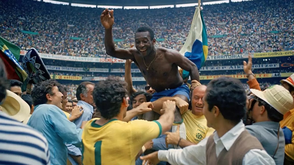 Pele hoisted by his teammates after Brazil's victory in the 1970 World Cup final.