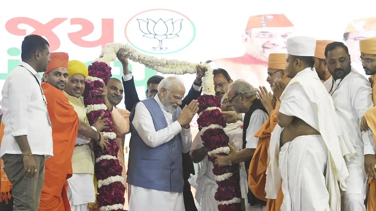 PM Modi felicitated by Gujarat's BJP unit during a rally on Wednednesday