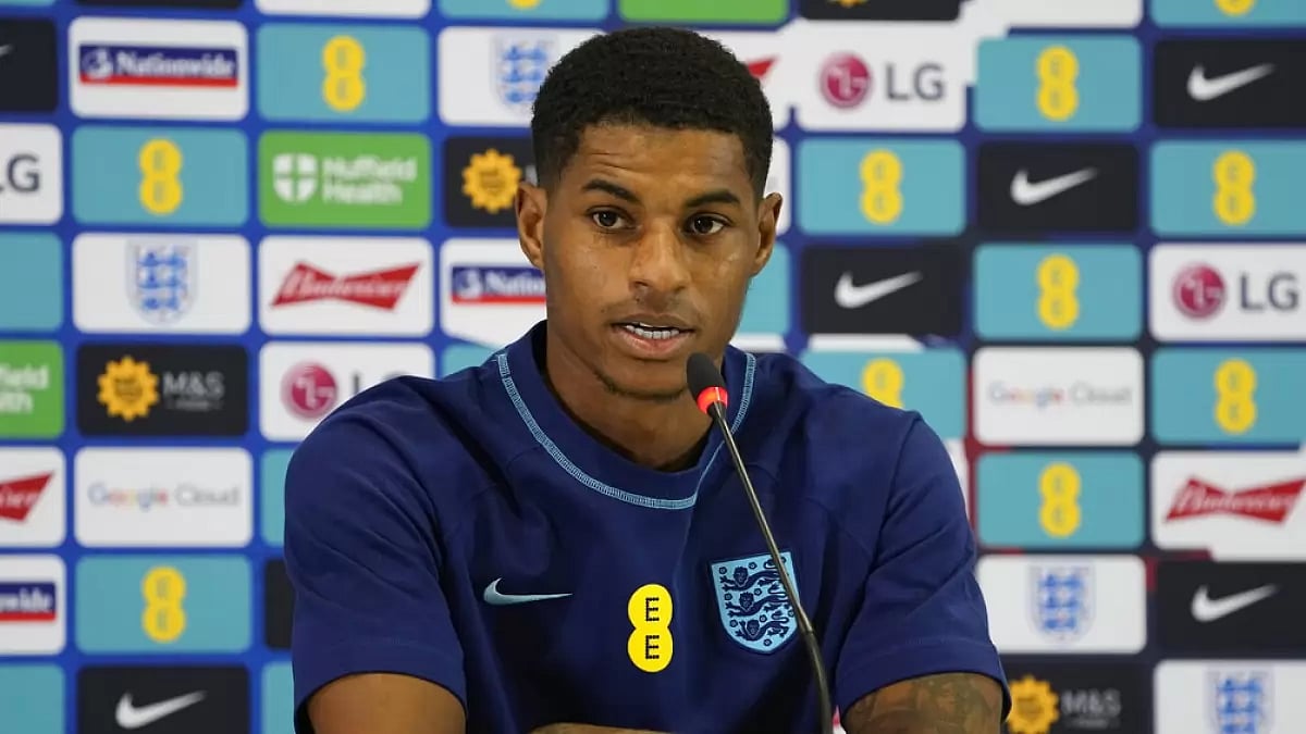 England's Marcus Rashford speaks at a press conference.