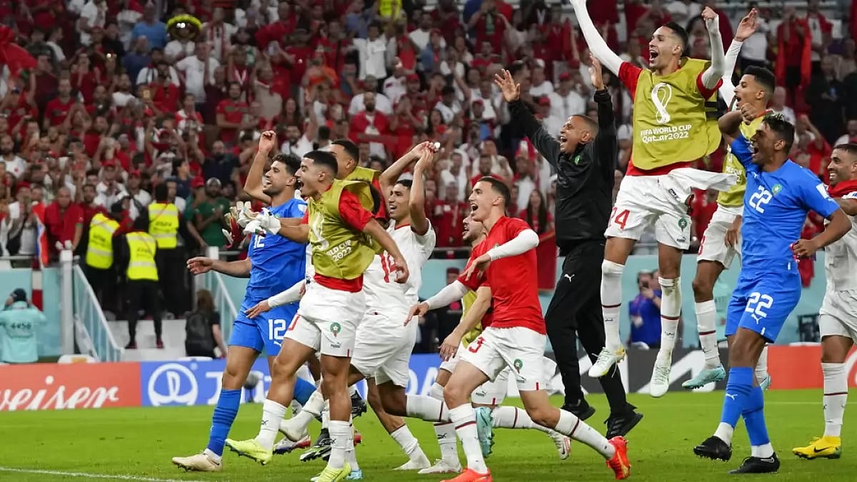 Morocco players celebrate after their 2-0 win over Belgium on Sunday.