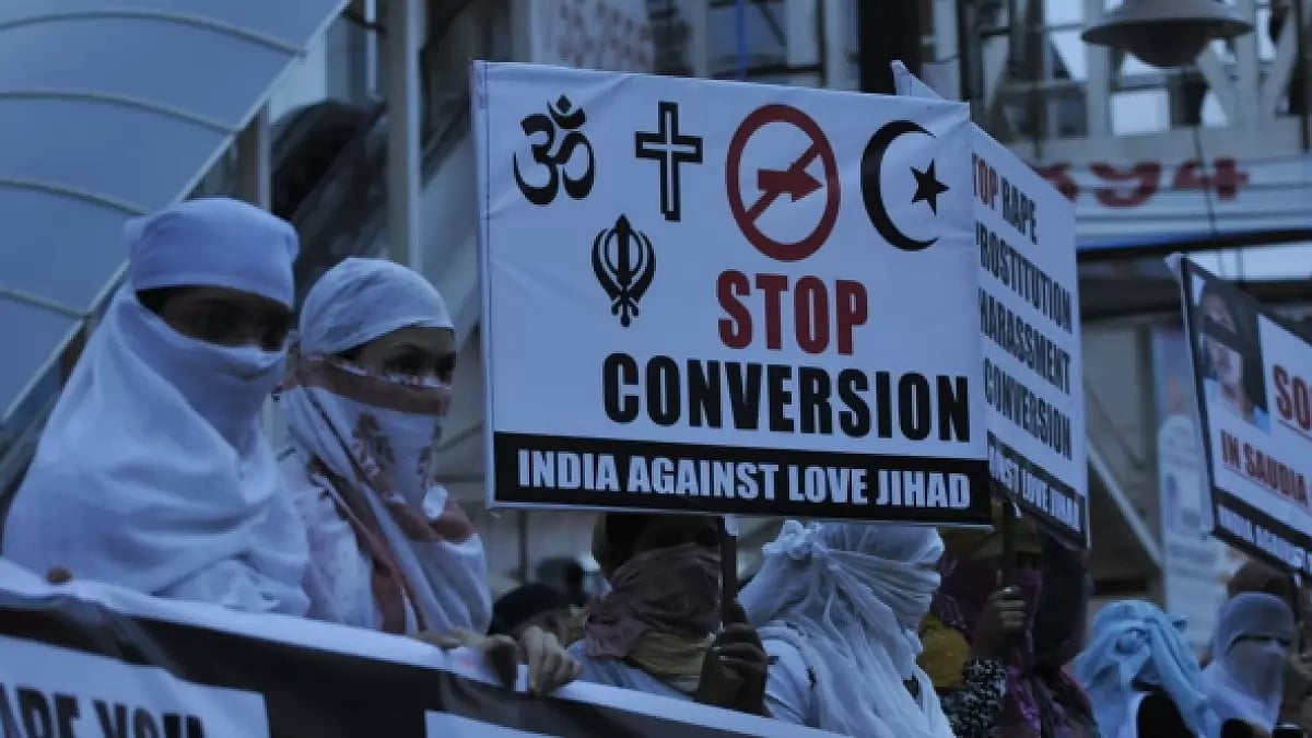 Women associated with India Against Love Jihad hold placards in Bhopal  - null