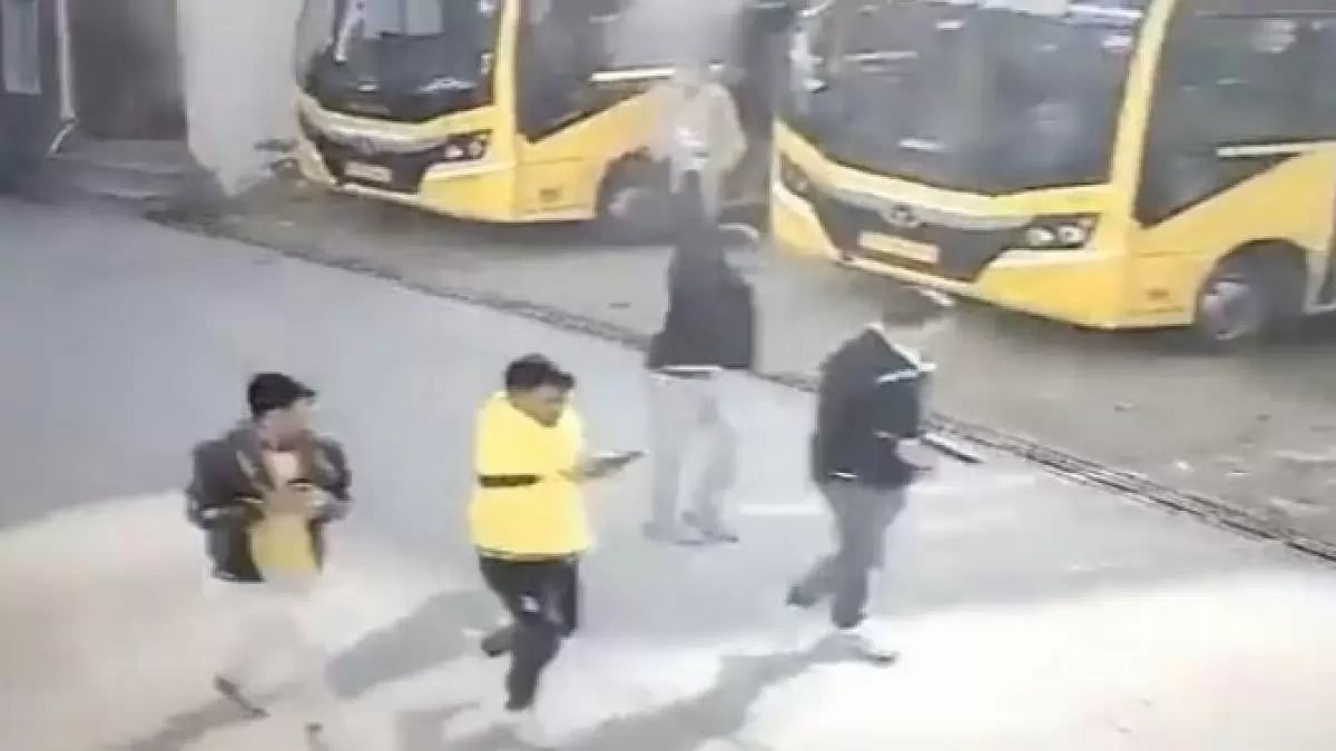 CCTV grab shows the assailants fleeing after the murder