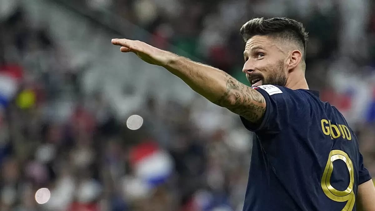 Giroud celebrates after scoring France's first goal against Poland. - null