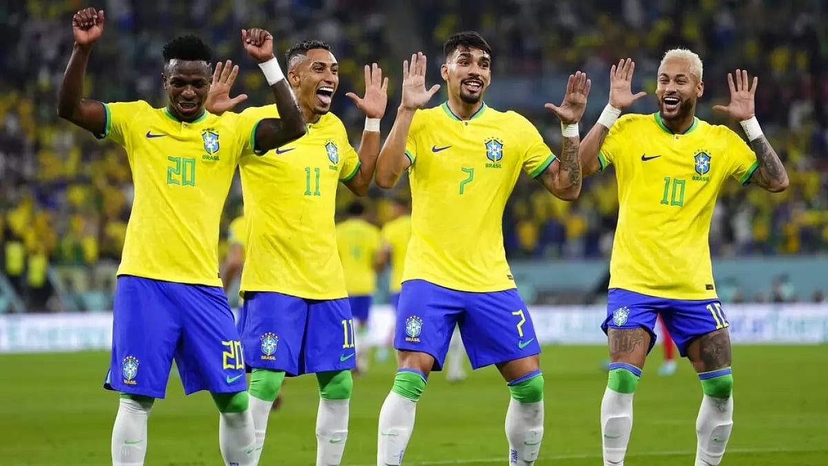 Brazilian players celebrate their team's second goal against South Korea on Monday.