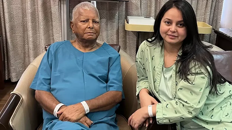 Lalu Yadav and Rohini Acharya