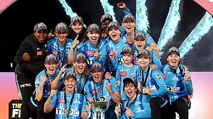 WBBL team Adelaide Strikers celebrate after winning the 2022 championship.