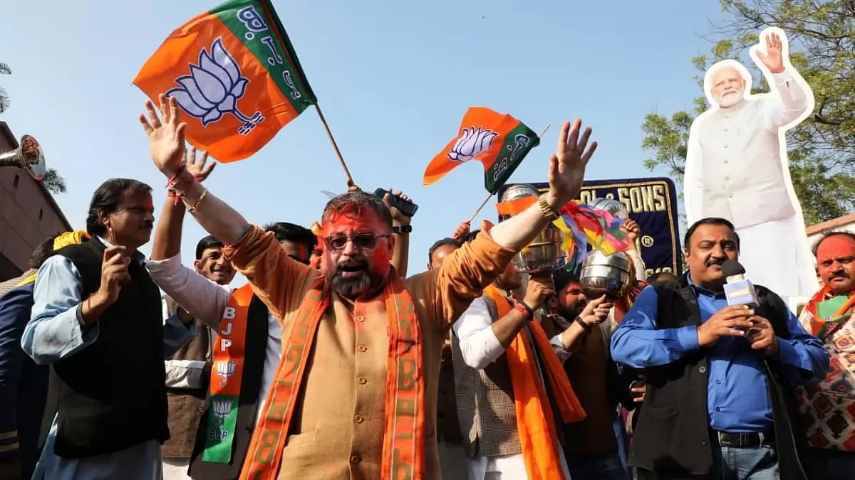 BJP party workers celebrating the landslide victory in Gujarat