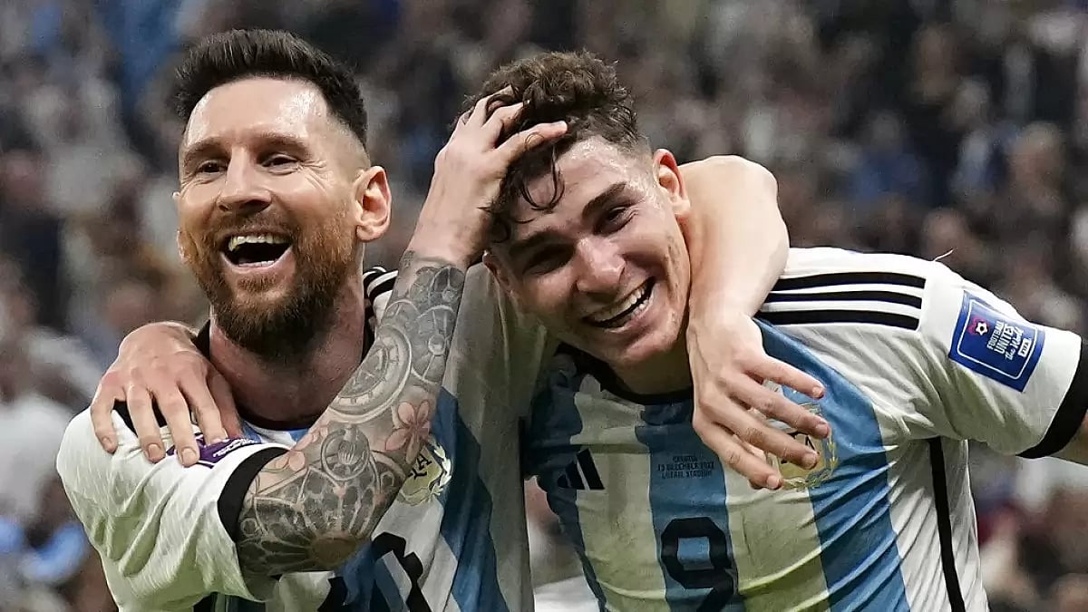 Julian Alvarez, right, is congratulated by Messi after scoring a goal against Croatia on Tuesday.