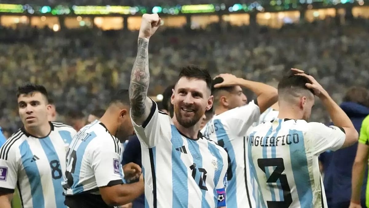 Lionel Messi, centre, celebrates with teammates after beating France in penalty shootout on Sunday.